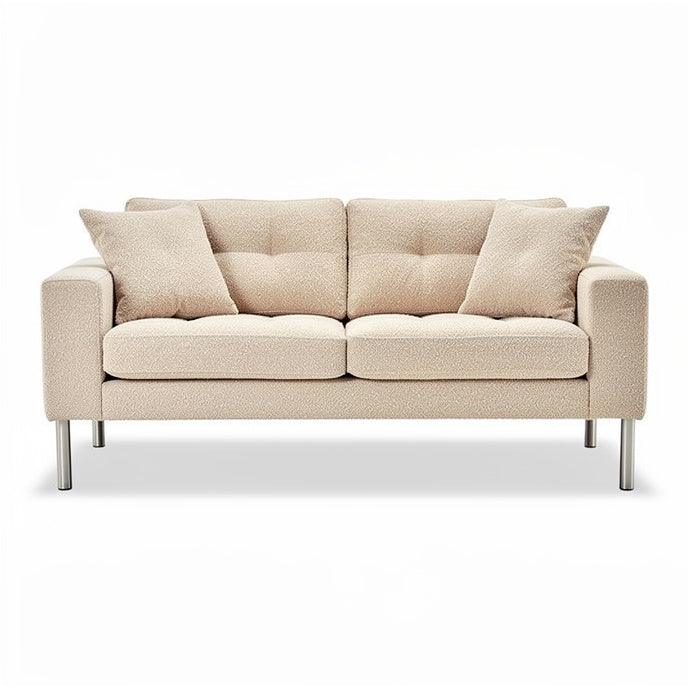 **Moderne beige bank met kussens en metalen poten**
